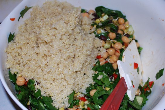 Add warm quinoa and mix gently