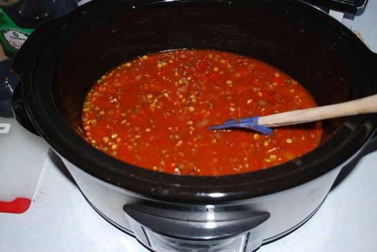 Saute onion, garlic and peppers. Add in spices and saute a minute more then throw that and the rest of the ingredients into the crockpot.