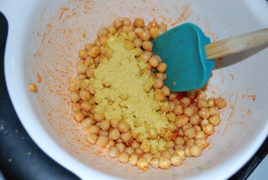 Add nutritional yeast, garlic powder, coriander, smoked paprika and tiny pinch of salt. Toss to coat well