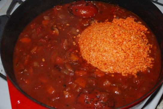 Add in tomatoes and let cook for 30-60 minutes. Add lentils and cook about 30 more minutes.
