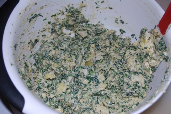 Add creamy cashew mixture to spinach/artichokes and stir well. Add in lemon juice, nutritional yeast and all the spices and combine well. Serve immediately sprinkled with a little smoked paprika or bake in the oven for 10-15 minutes at 300 degrees