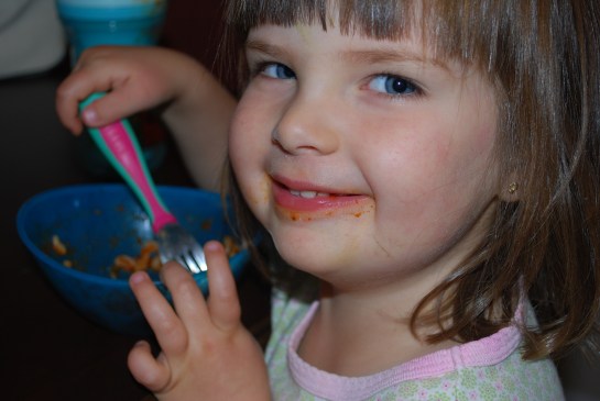 Ava's still working on her dinner, cake later